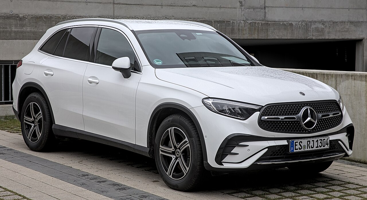 Mercedes-Benz GLC and GLE luxury crossovers on scenic alpine road
